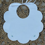 Personalised Spanish White With Blue Flowers Scallop Bib