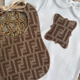 Baby’s Brown Inspired Sleepsuit & Bib Set