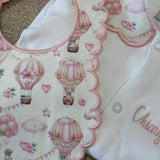 Girls Pink Hot Air Balloon Handmade Sleepsuit And Scallop Bib