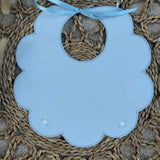 Personalised Spanish Blue With Flowers Scallop Bib