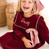 The Rosalie Personalised Burgundy Cord Dress With Blush Velvet Bow